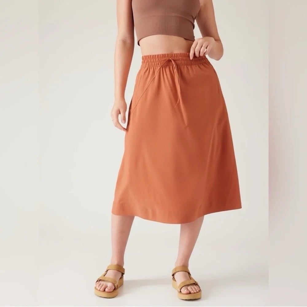 Athleta Arrival Midi Skirt Sunbaked Clay Orange size 6 Athleisure Lightweight
